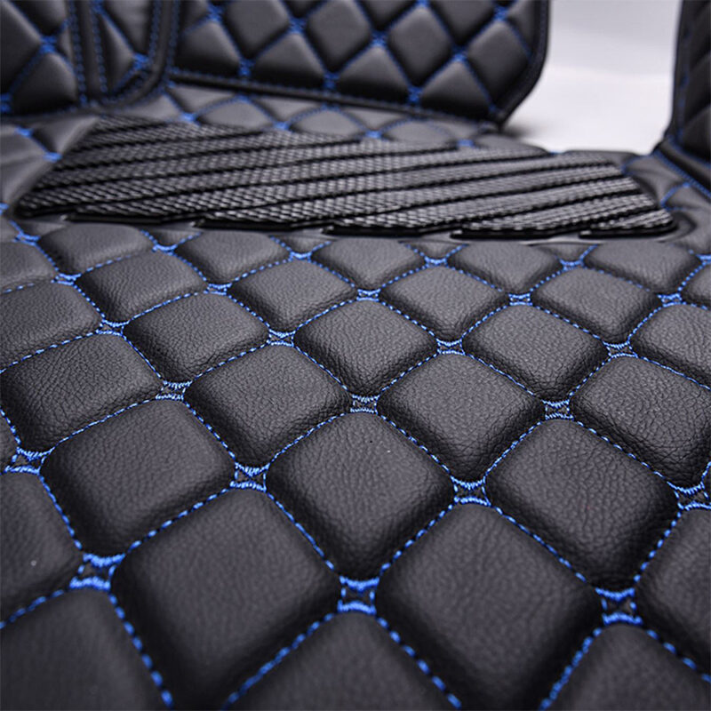 Black Leather and Blue Stitching Diamond Car Mats Closeup