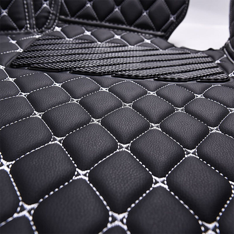 Black Leather and White Stitching Diamond Car Mats Closeup